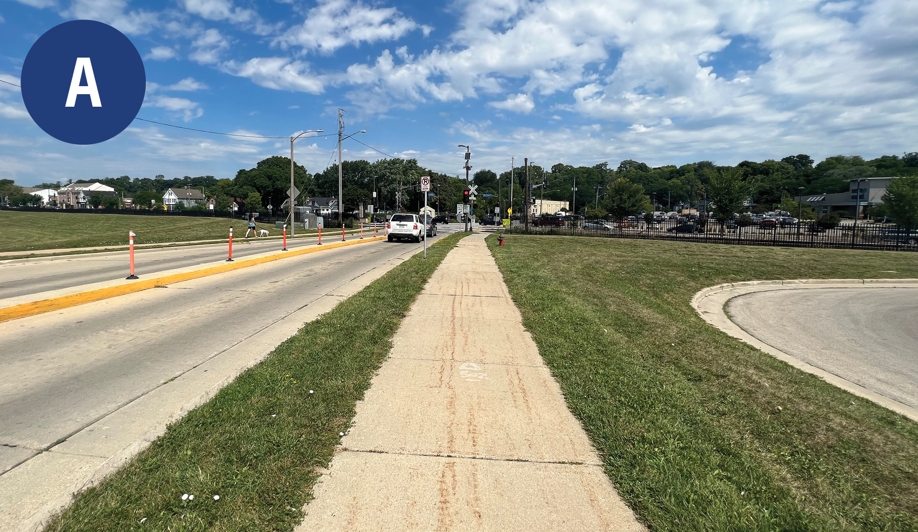 View of a pedestrian rail crossing from 50 yards before the rail