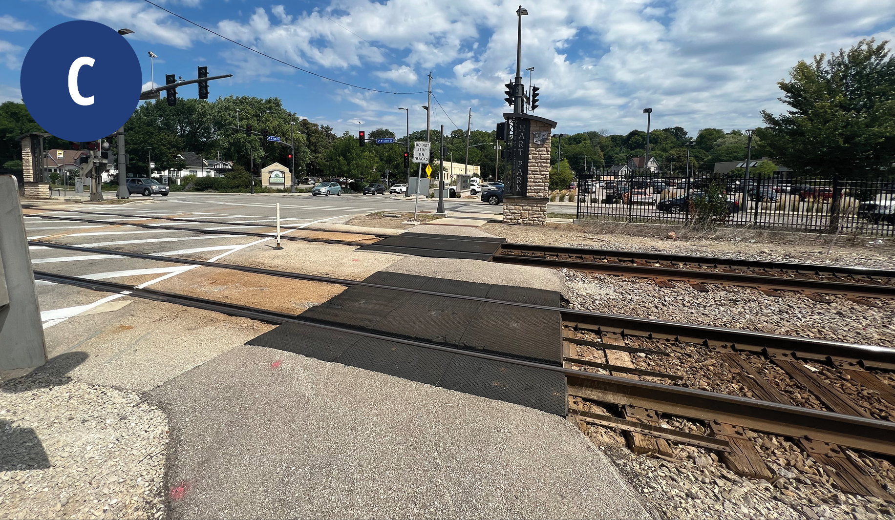 View of a pedestrian rail crossing right in front of the rail